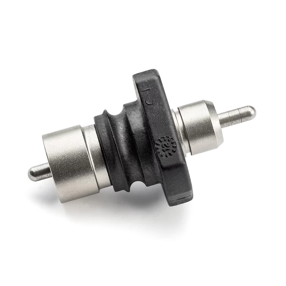 macro precis plastic injection Pièce plastique noire surmoulée sur un insert métallique usiné